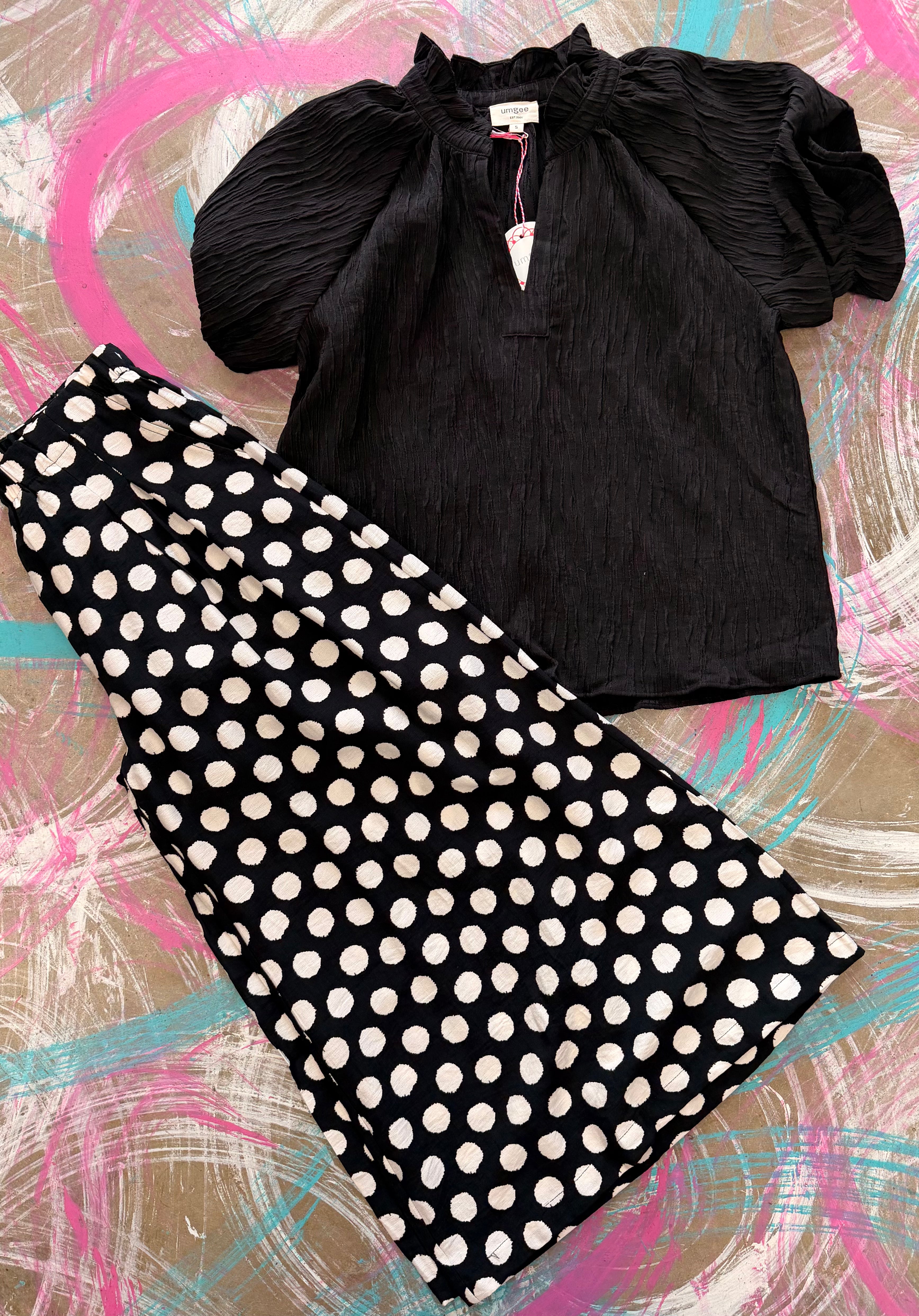 White polka dot pants