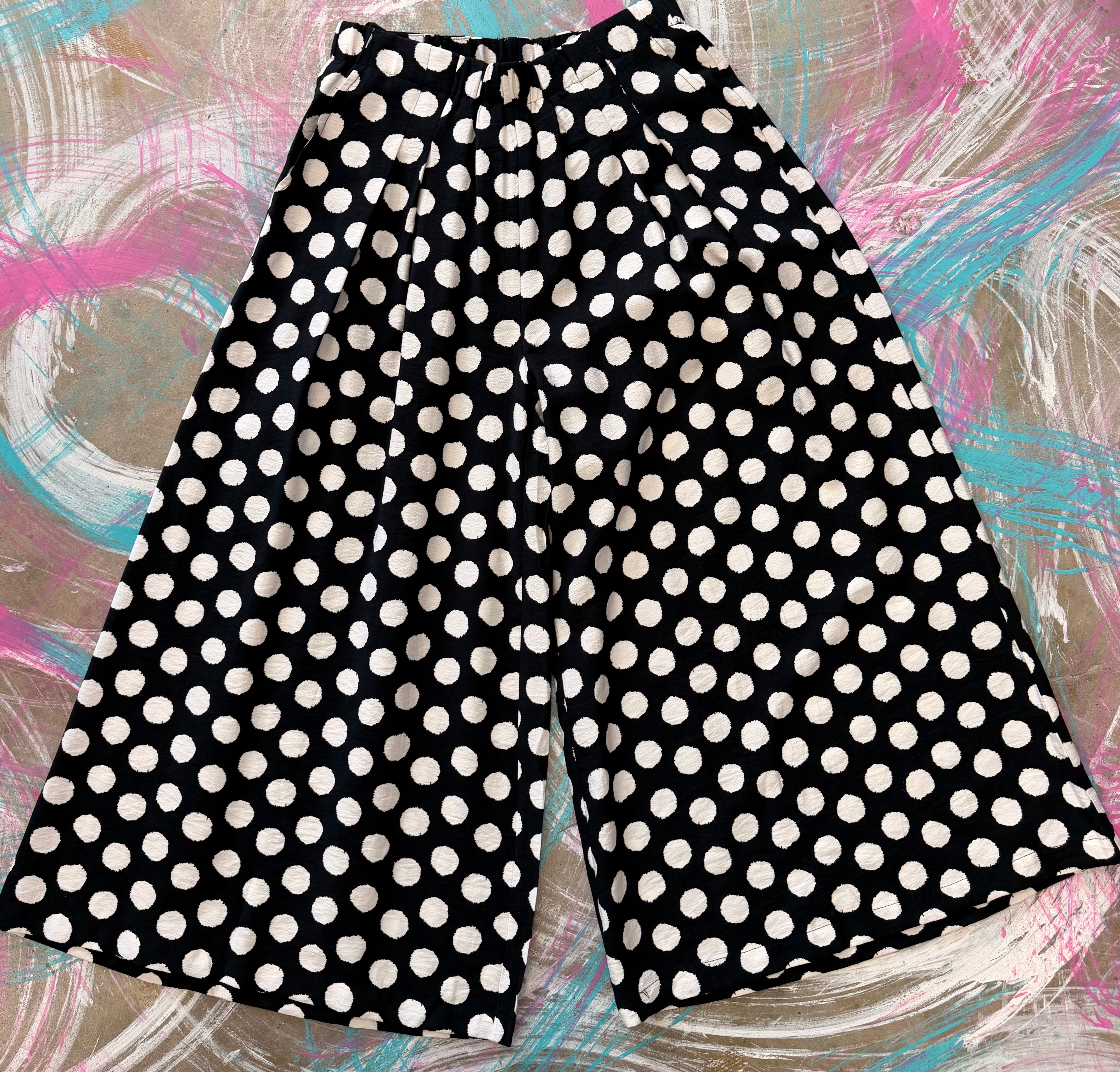White polka dot pants